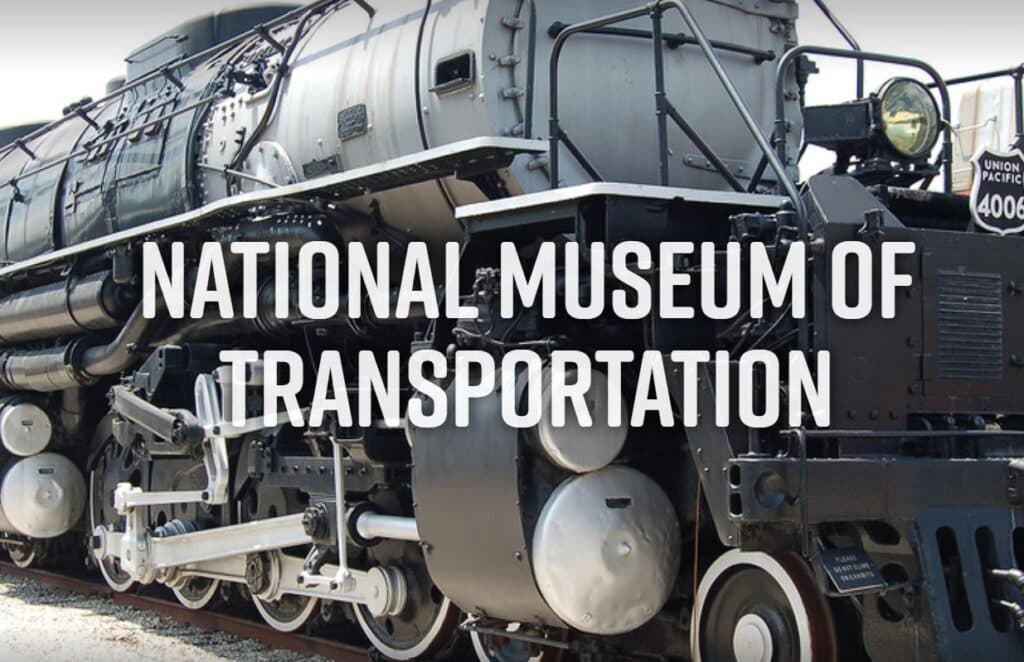 A close-up of a vintage steam locomotive at the National Museum of Transportation.