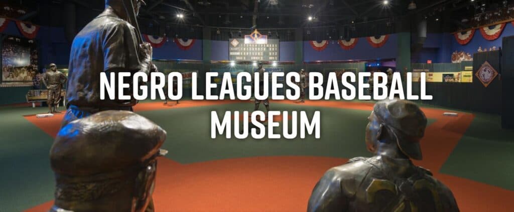 Interior view of the Negro Leagues Baseball Museum featuring statues and decorative elements.