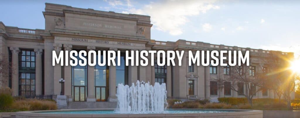 Exterior view of the Missouri History Museum with a fountain in the foreground.